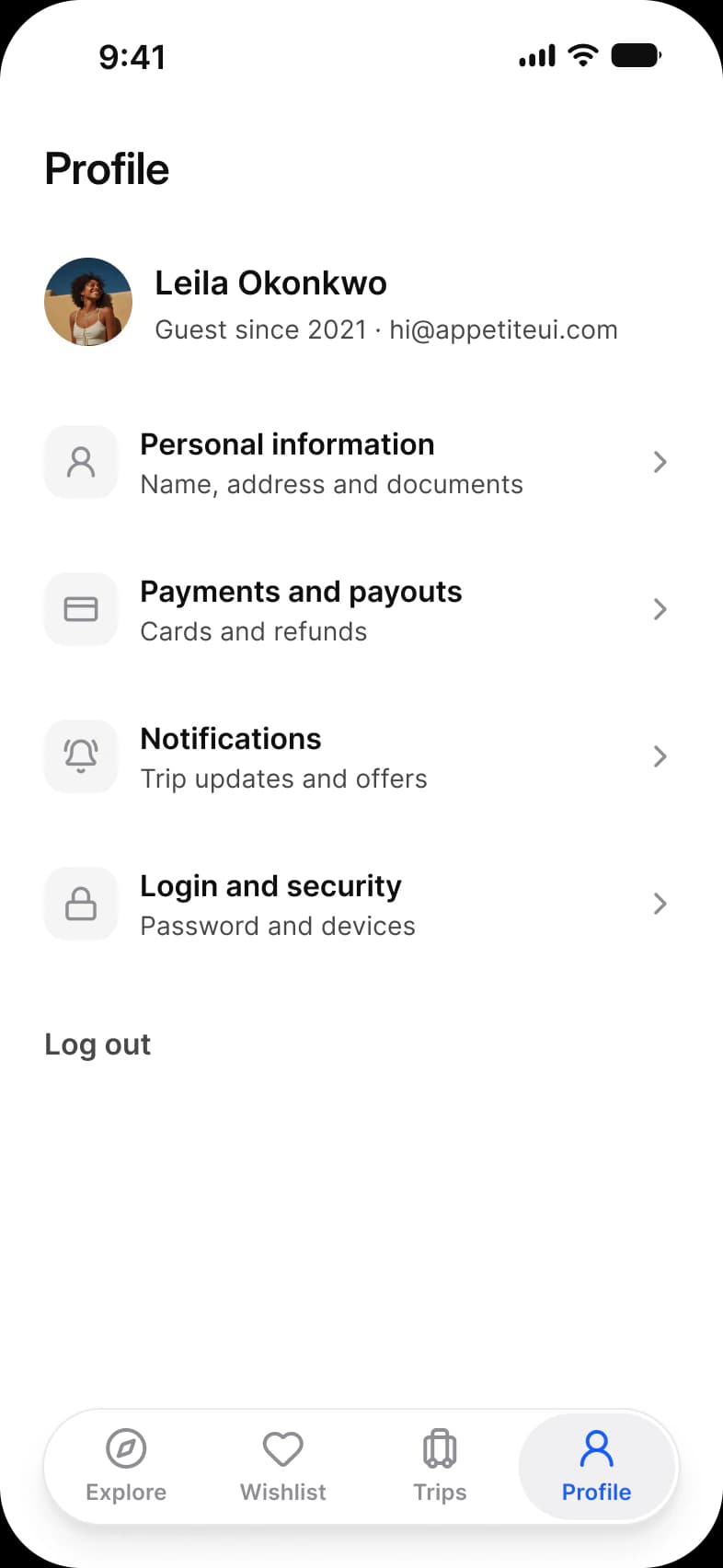 Booking app Profile screen: Leila Okonkwo with her photo, four rows for Personal information, Payments and payouts, Notifications and Login and security, and a Log out button above a floating tab bar