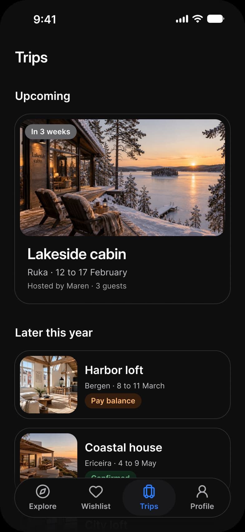 Booking app Trips screen in dark mode: an Upcoming card for Lakeside cabin with an In 3 weeks label, and Later this year rows for Harbor loft with a Pay balance label and Coastal house with a Confirmed label, above a floating tab bar