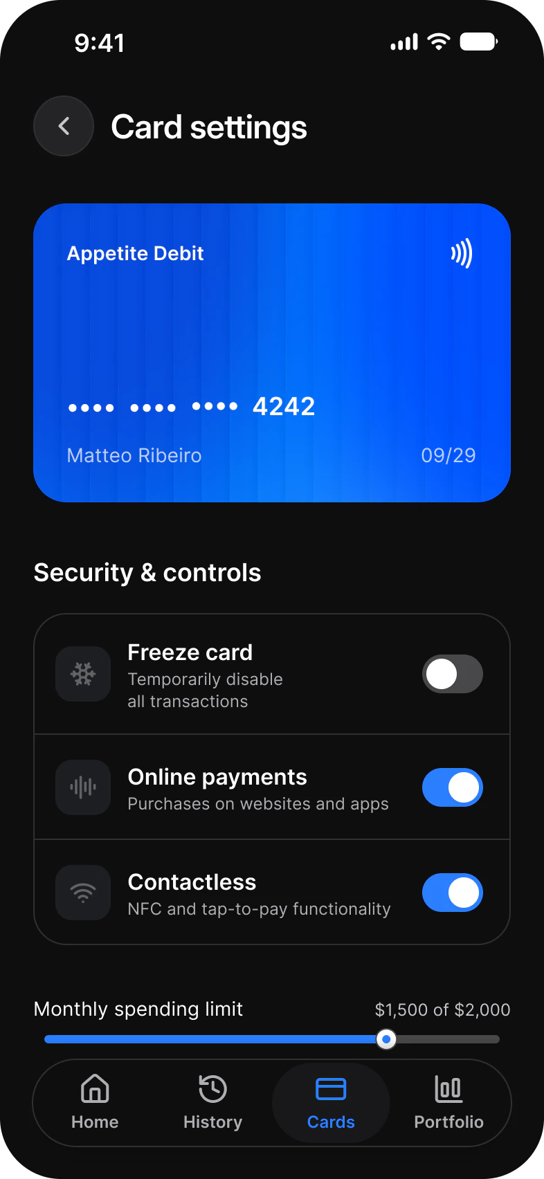 Finance app Card settings screen in dark mode: an Appetite Debit card ending 4242, a Security and controls list with Freeze card, Online payments and Contactless switches, and a Monthly spending limit slider at $1,500 of $2,000