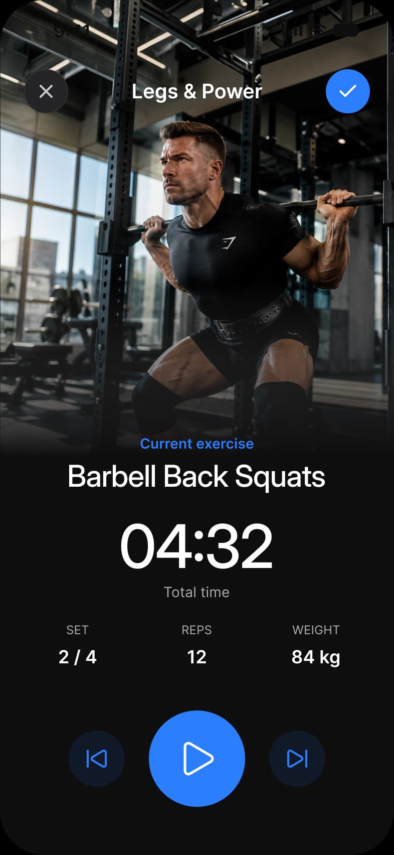 Fitness app Exercise screen in dark mode: a full height photo of a barbell back squat under a Legs and Power title with close and confirm buttons, Barbell Back Squats as the current exercise, a 04:32 timer, set 2 of 4, 12 reps, 84 kg, and previous, play and next controls
