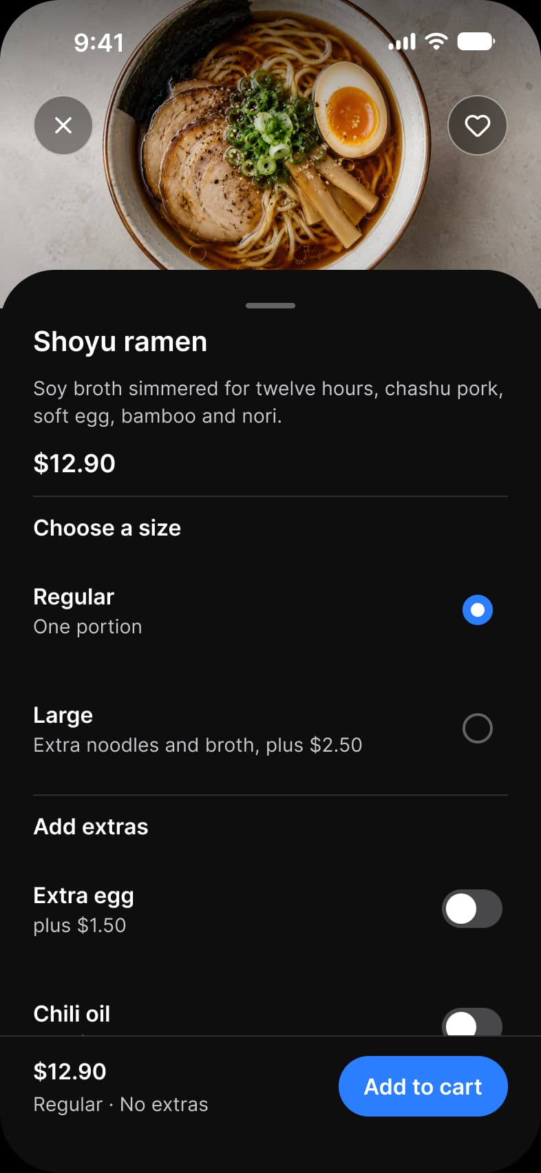 Foodie app Dish screen in dark mode: a sheet over a bowl of shoyu ramen with a close and a favorite button, the description and the price $12.90, a Choose a size choice between Regular and Large, Add extras switches for Extra egg and Chili oil, and an Add to cart bar