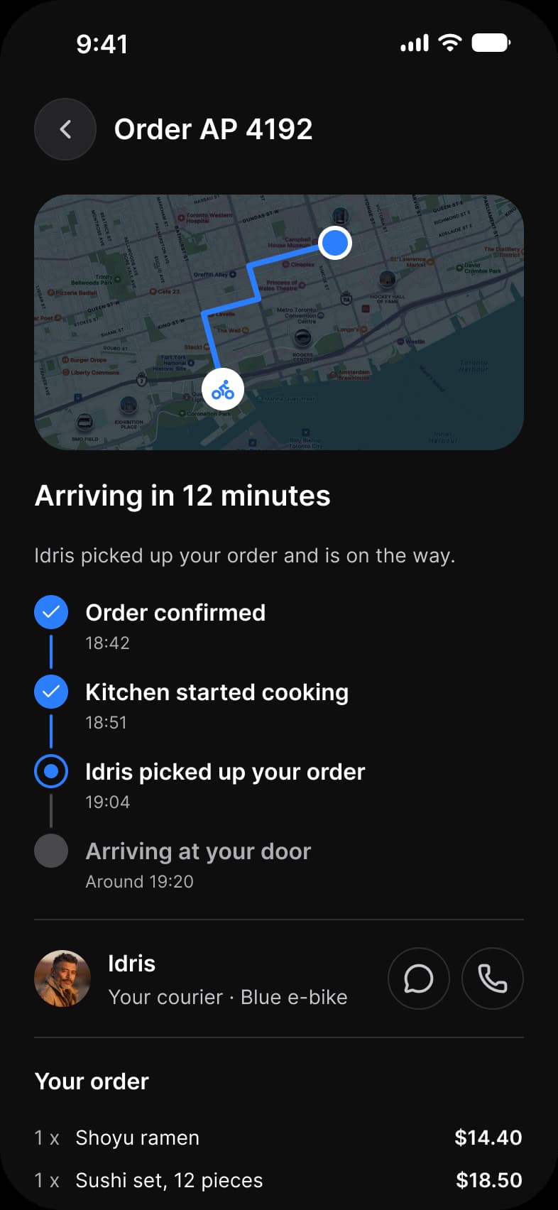 Foodie app Tracking screen in dark mode: Order AP 4192 with a map and a route, Arriving in 12 minutes, a four step timeline that stops at Idris picked up your order, courier Idris with chat and call buttons, and the order lines Shoyu ramen and Sushi set
