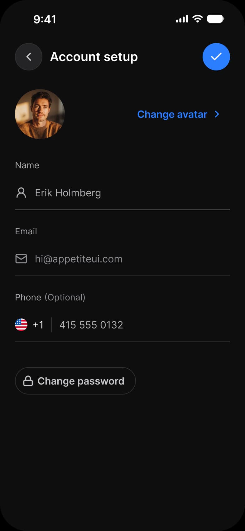 Account setup screen in dark mode: a top bar with a back button and a blue confirm button, a profile photo with a Change avatar link, Name, Email and optional Phone fields with a country flag, and a Change password button