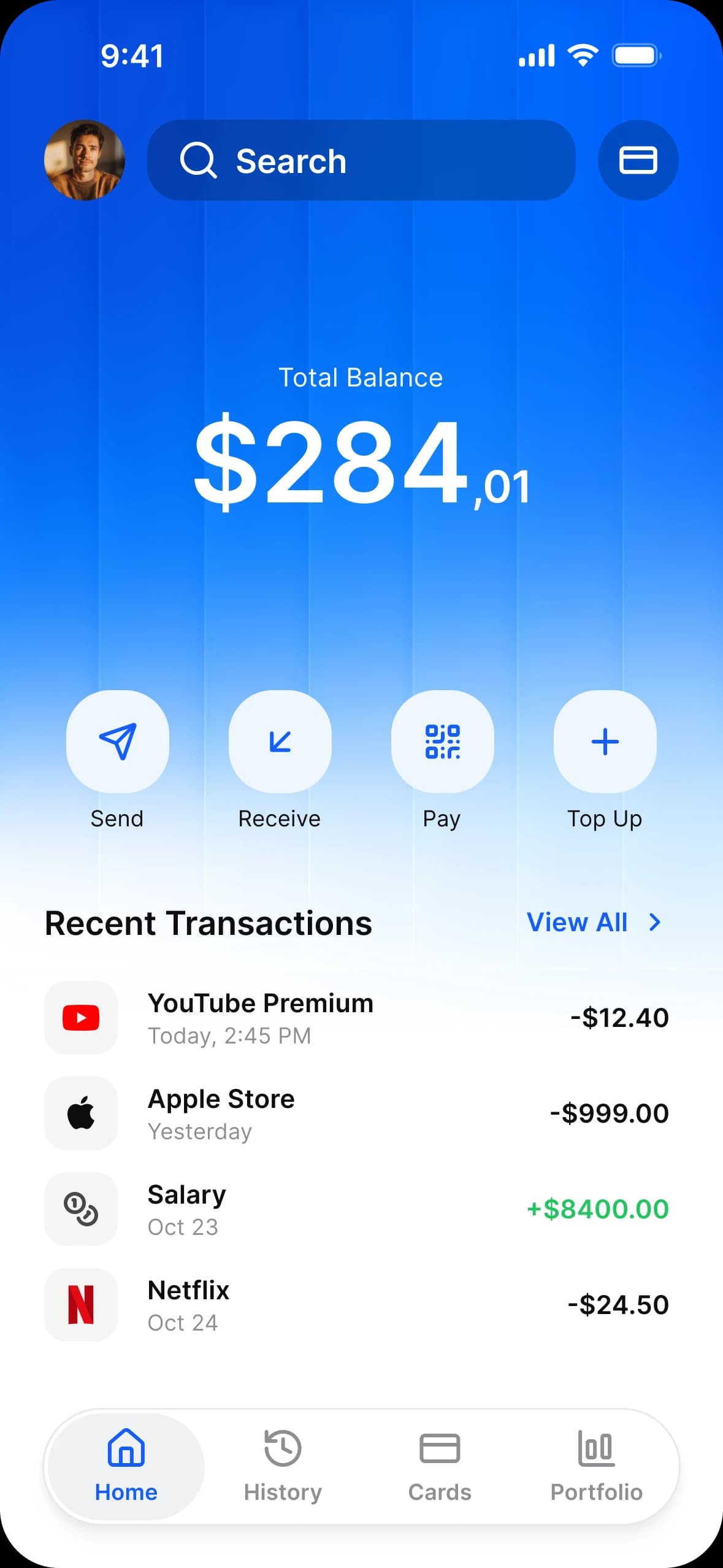 Finance app home in light mode: a total balance card, Send, Receive, Pay and Top Up, and recent transactions