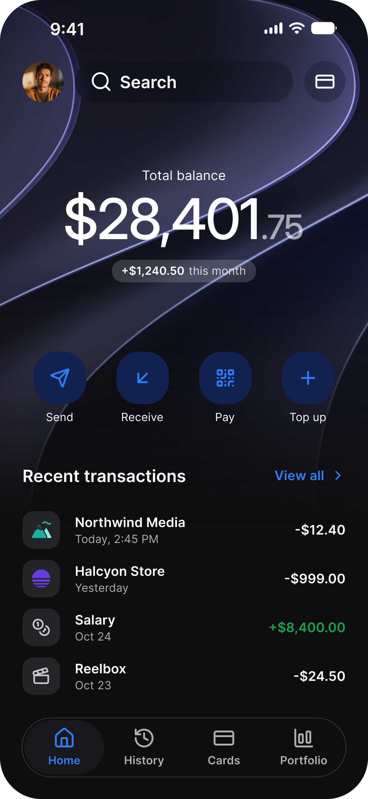 Finance app home in dark mode: a total balance with its change this month, Send, Receive, Pay and Top up, and recent transactions