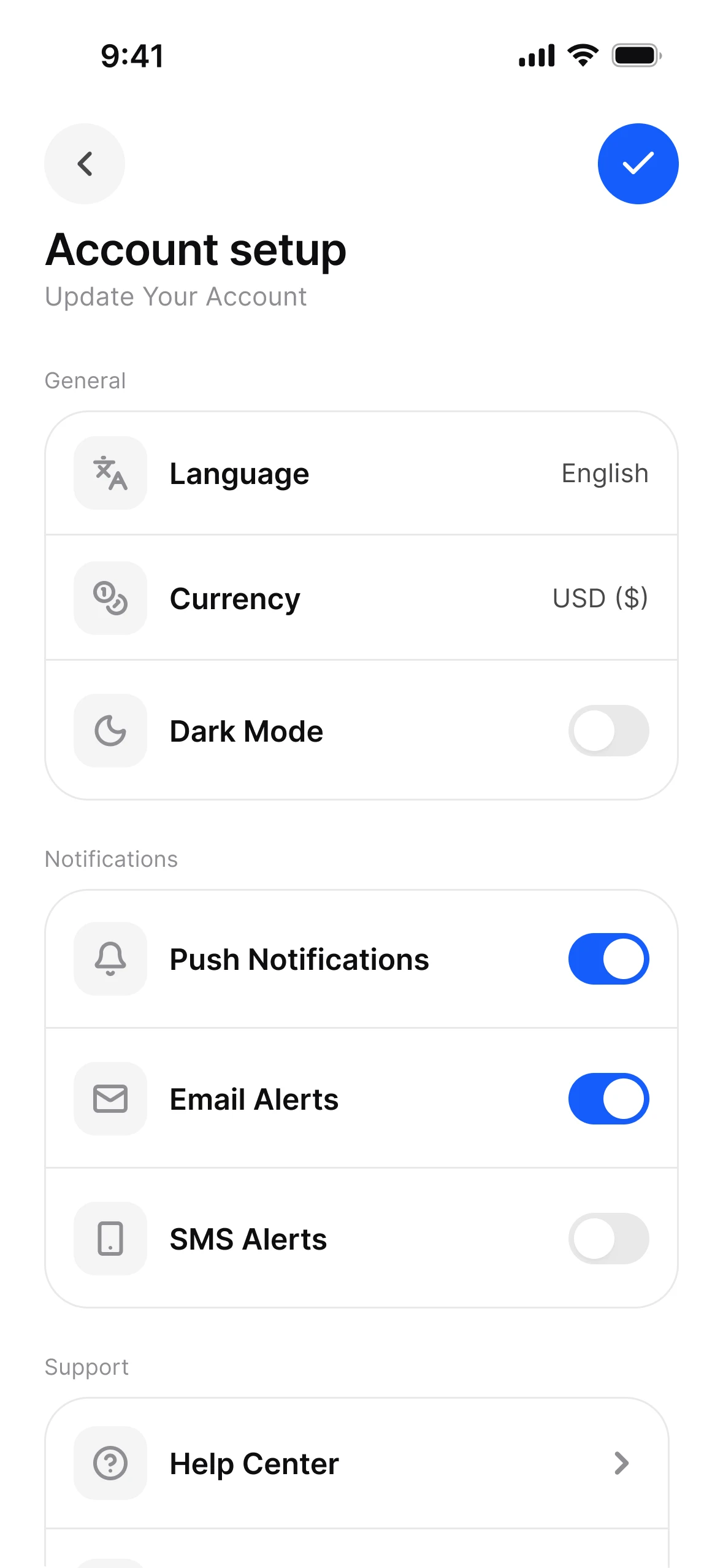 Account setup in light mode: language, currency and dark mode rows, and switches for push, email and SMS alerts